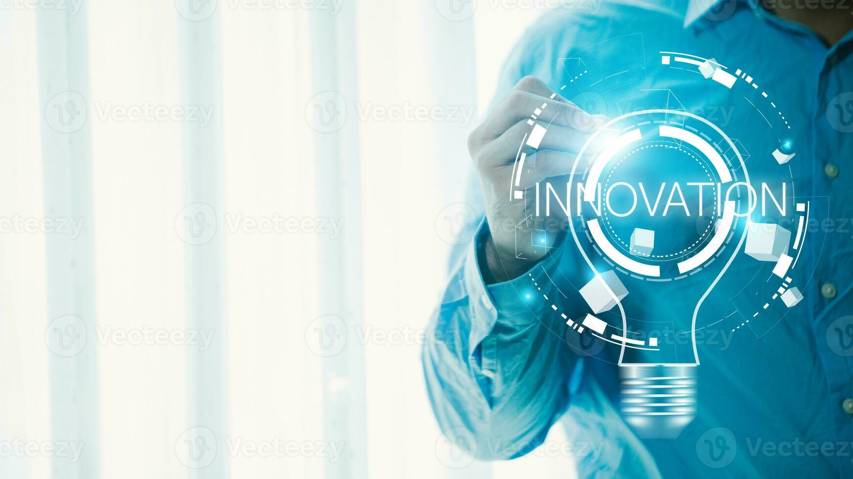 Innovation and innovation concept. Businessman drawing on virtual screen. photo