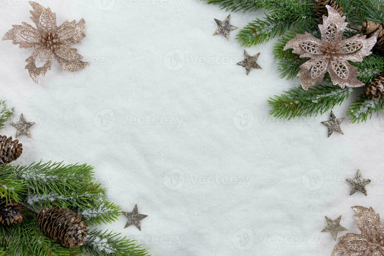 Christmas fir tree branches flat lay with pine cones and decoration on snow background. Creative composition with border. Top view. Copy space. photo