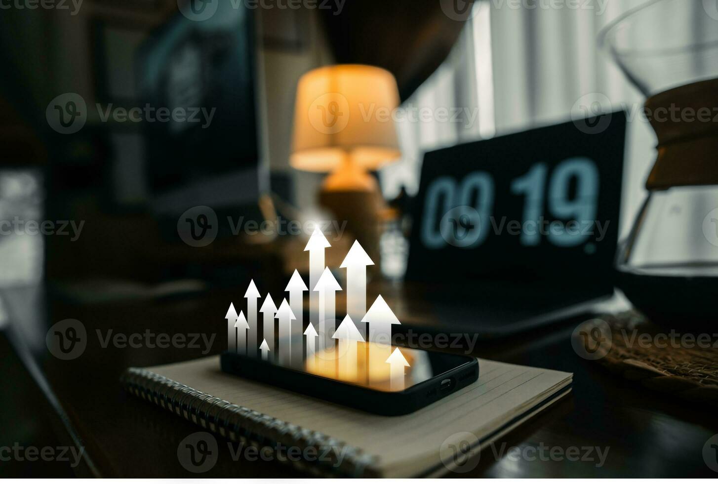 business growth concept,Light arrow pointing up on the desk photo