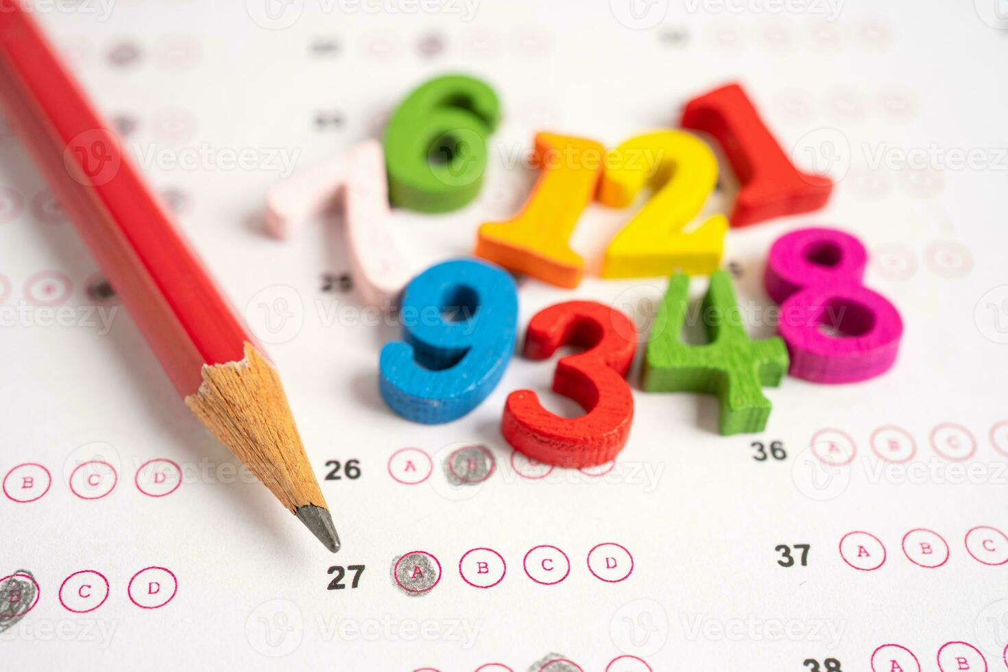 Math number and pencil on answer sheet paper, Education study testing learning teach concept. photo
