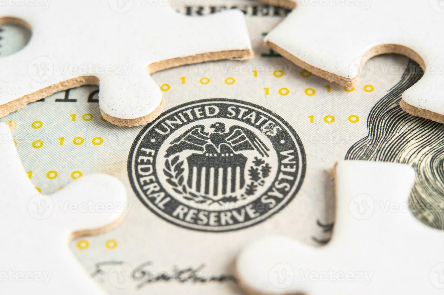The Federal Reserve System with jigsaw puzzle paper, the central banking system of the United States of America. photo