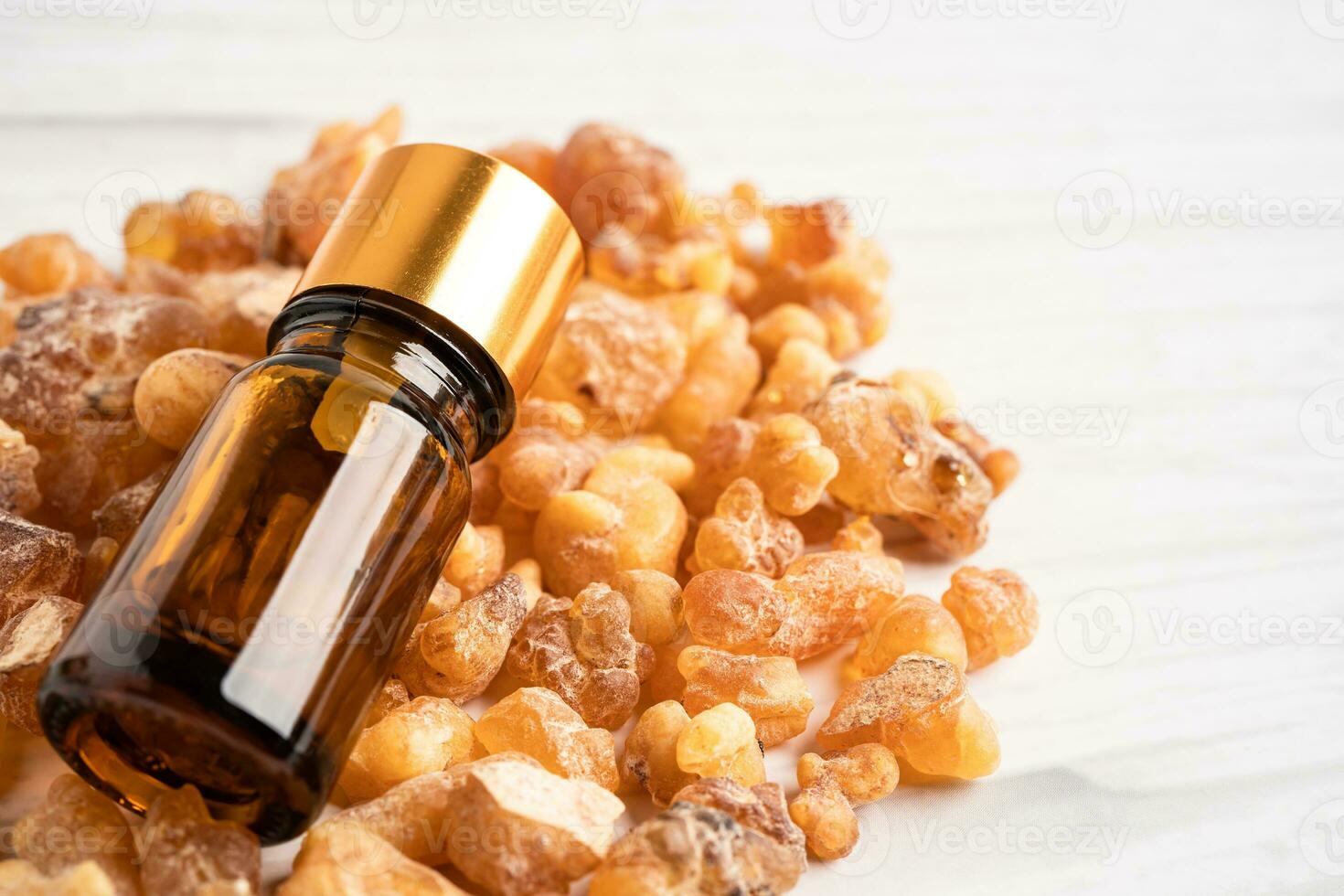 Frankincense or olibanum aromatic resin isolated on white background used in incense and perfumes. photo