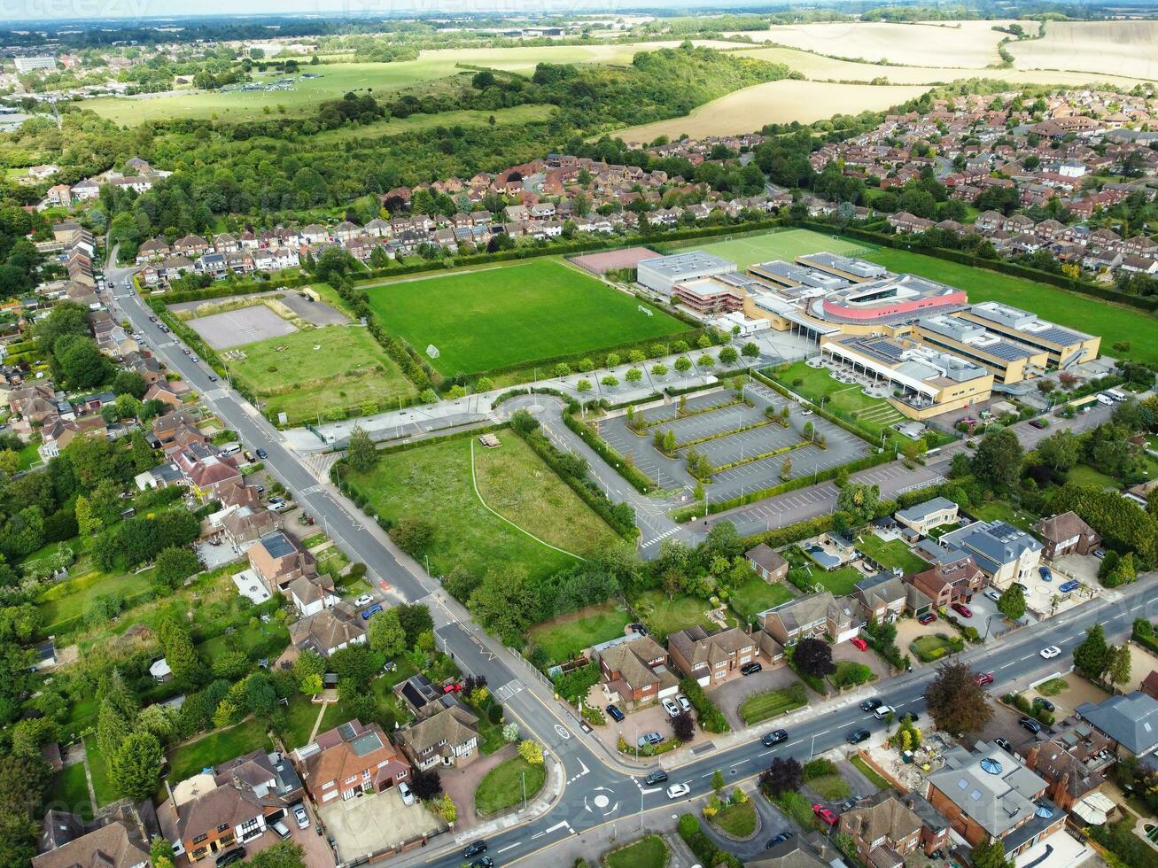 High Angle Footage of Residential Real Estate Homes at East of Luton City of England, Great Britain. Footage Was Captured with Drone's Camera on August 15th, 2023 During Sunset Time. photo