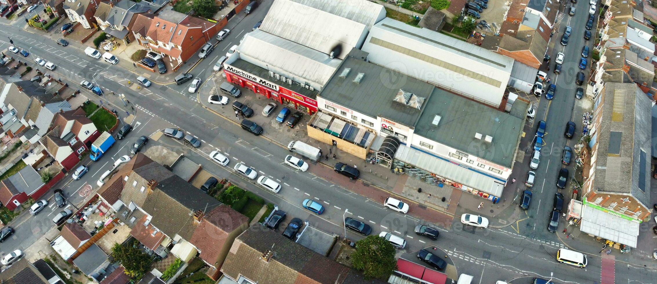 Aerial View of Residential Homes and Industrial Estate Combined at Dallow Road Near Farley Hills Luton City, England UK. The High Angle Footage Was Captured with Drone's Camera on September 7th, 2023 photo