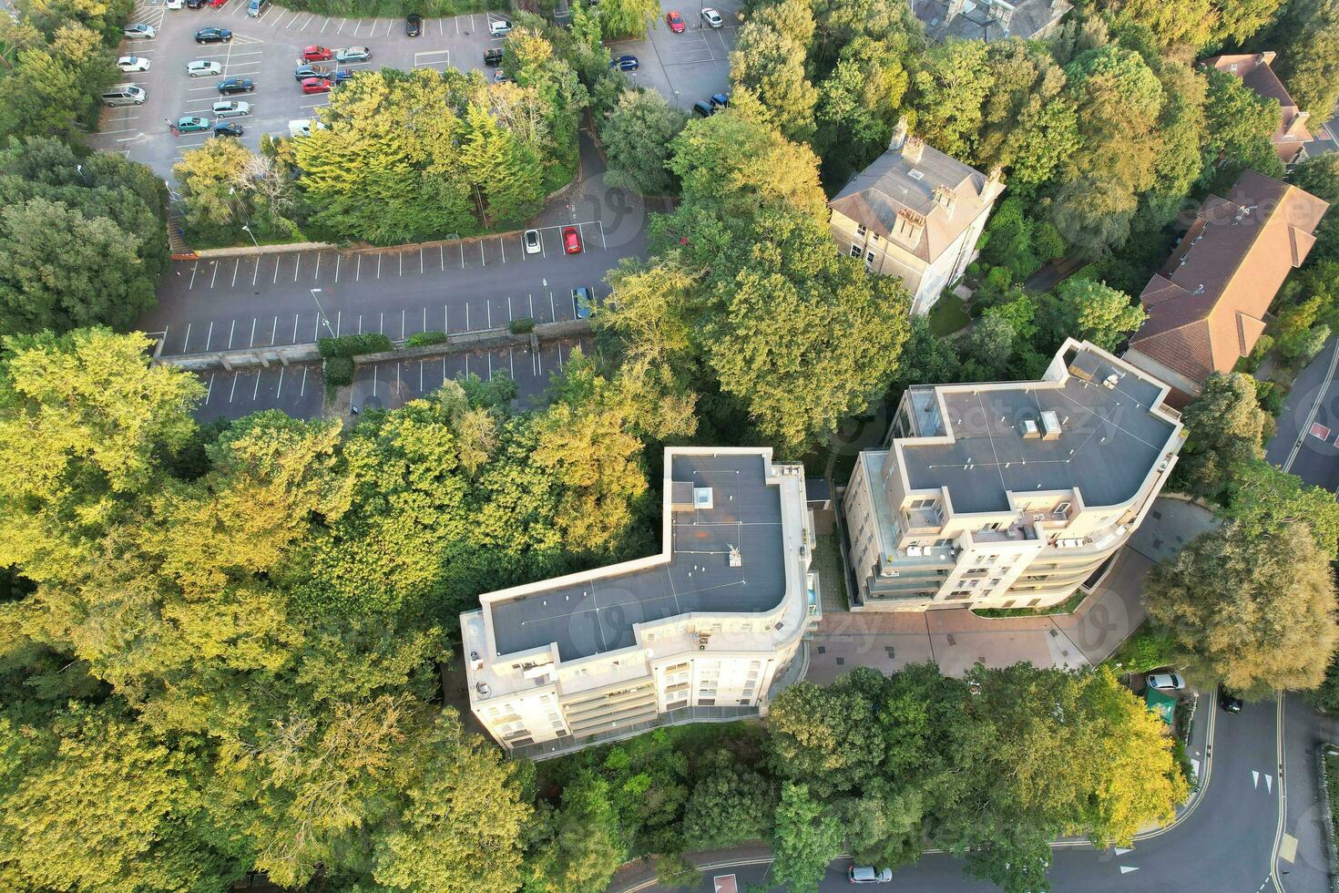 Aerial View of British Tourist Attraction of Bournemouth Beach and Sea view City of England Great Britain UK. Image Captured with Drone's Camera on September 9th, 2023 During Sunset photo