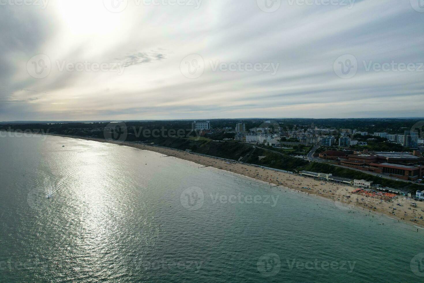 Aerial View of Most Beautiful and Attractive Tourist Destination at Bournemouth City Sandy Beach of England Great Britain, Image Was Captured with Drone's Camera on August 23rd, 2023 During sunny Day. photo