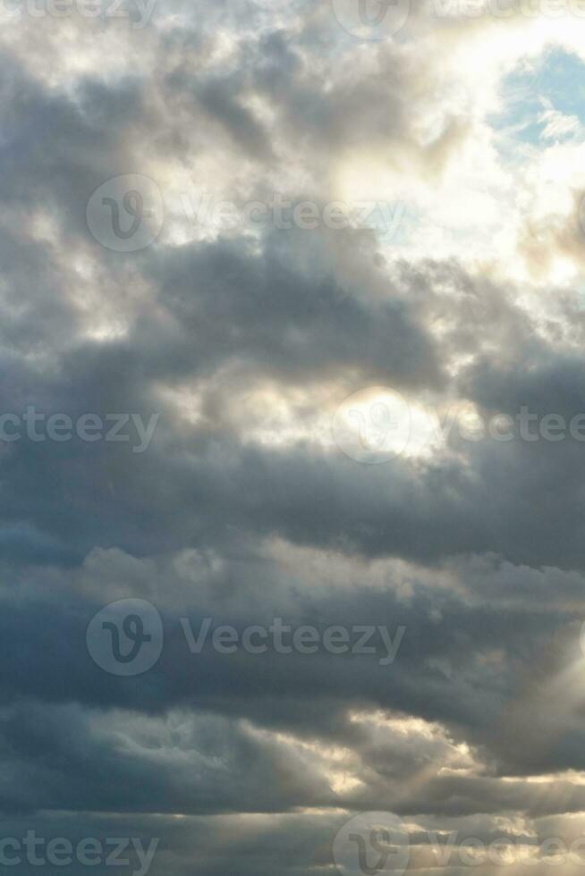 High Angle Footage of Most Beautiful Natural Orange Sunset with Orange Clouds and Sky over Luton City of England UK. Image Was Captured with drone's Camera on August 19th, 2023 photo