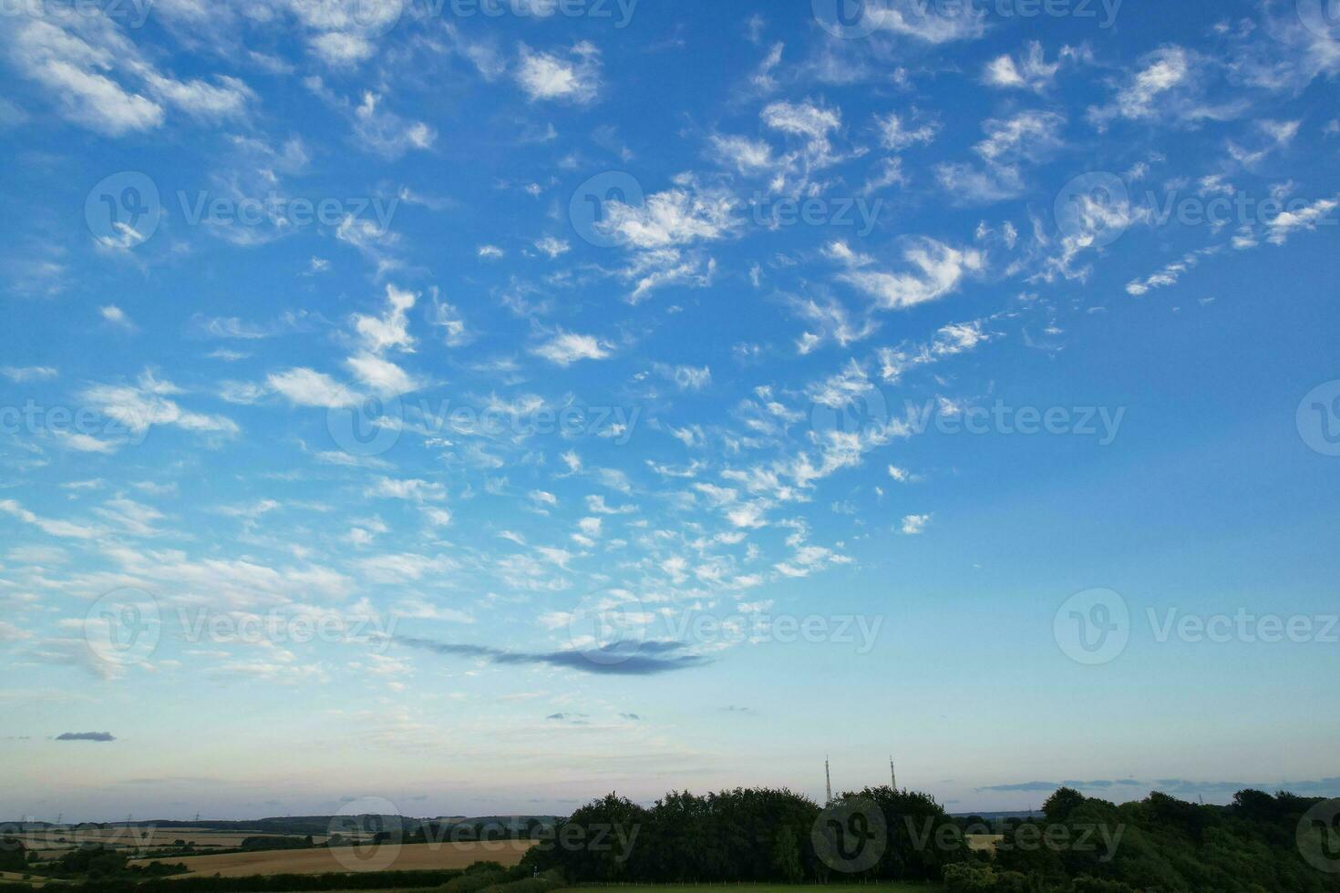 High Angle Footage of Most Beautiful Natural Orange Sunset with Orange Clouds and Sky over Luton City of England UK. Image Was Captured with drone's Camera on August 19th, 2023 photo