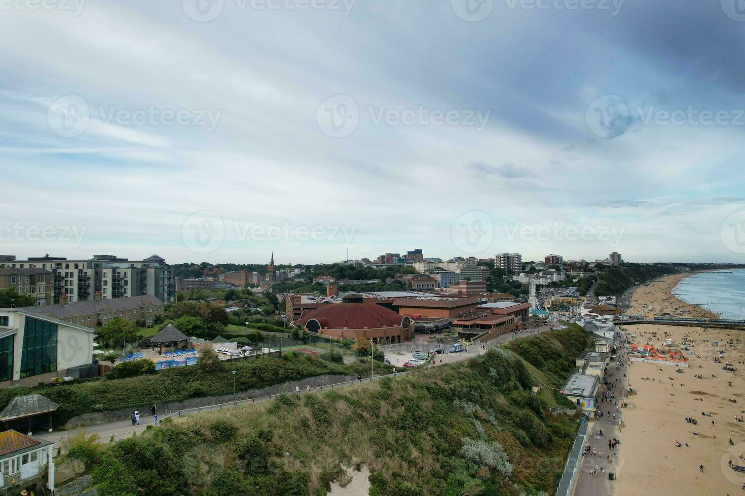 Ariel Footage of Attractive Tourist Destination at Bournemouth City Sandy Beach and Ocean of England Great Britain, Aerial Footage Captured with Drone's Camera on August 23rd, 2023 During sunny Day. photo