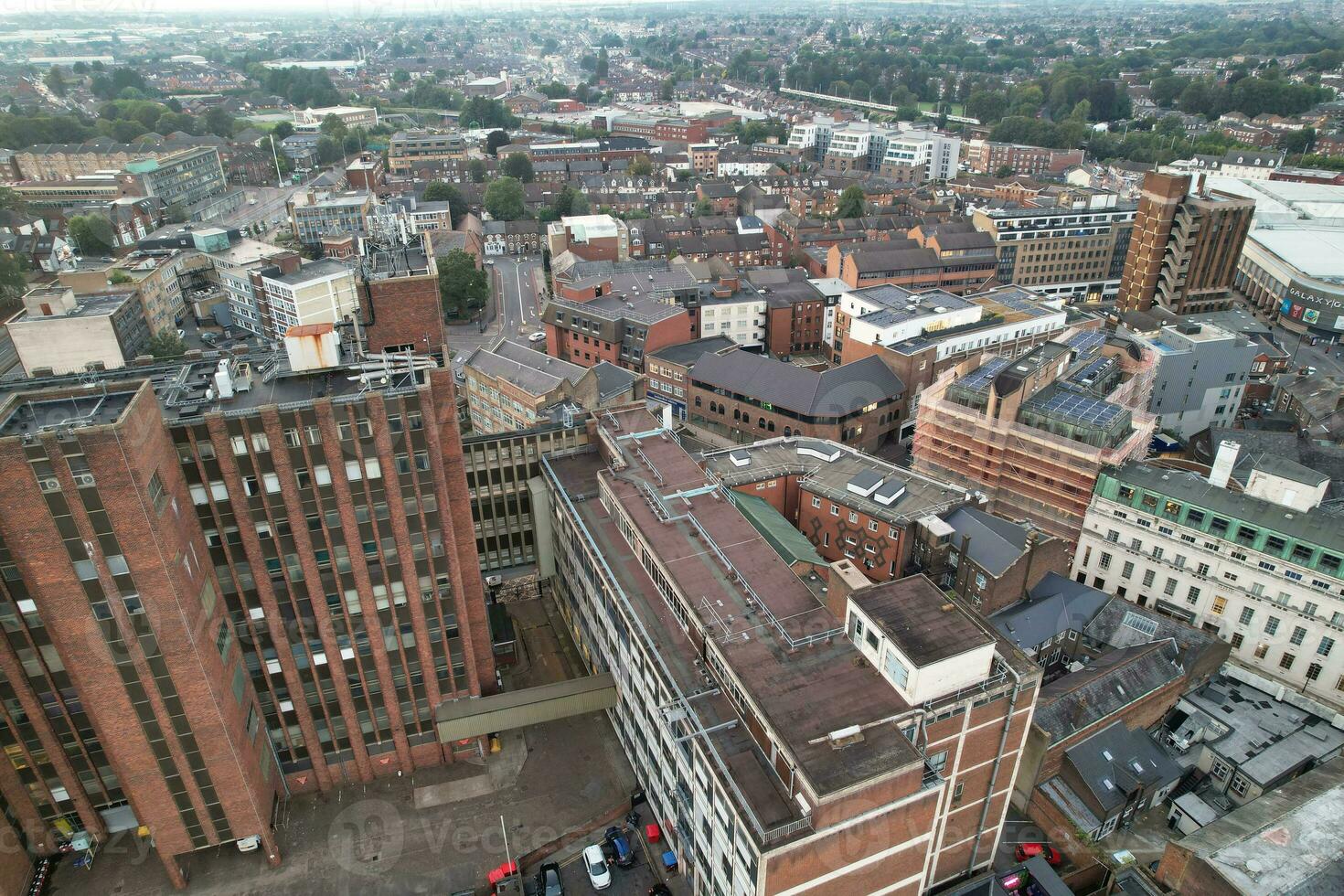 Aerial View of Illuminated Downtown Buildings, Roads and Central Luton City of England UK at Beginning of Clear Weather Night of September 5th, 2023 photo