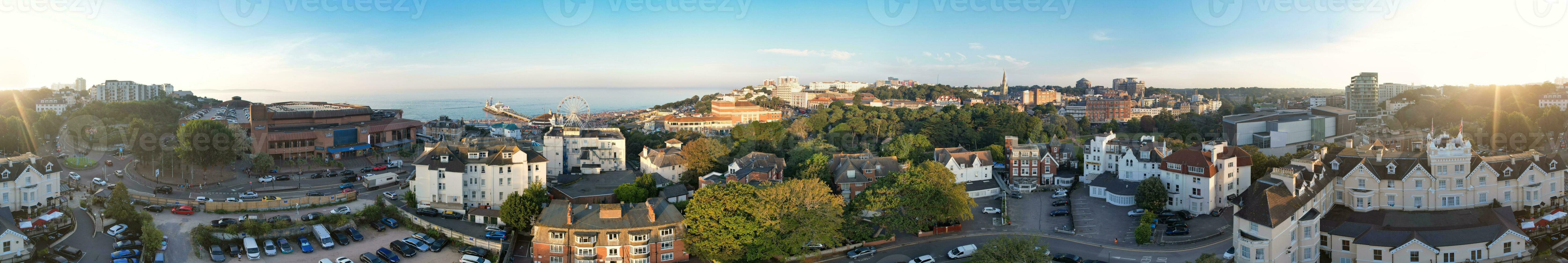 Aerial Panoramic View of British Tourist Attraction at Sea View of Bournemouth City of England Great Britain UK. High Angle Image Captured with Drone's Camera on September 9th, 2023 During Sunset photo
