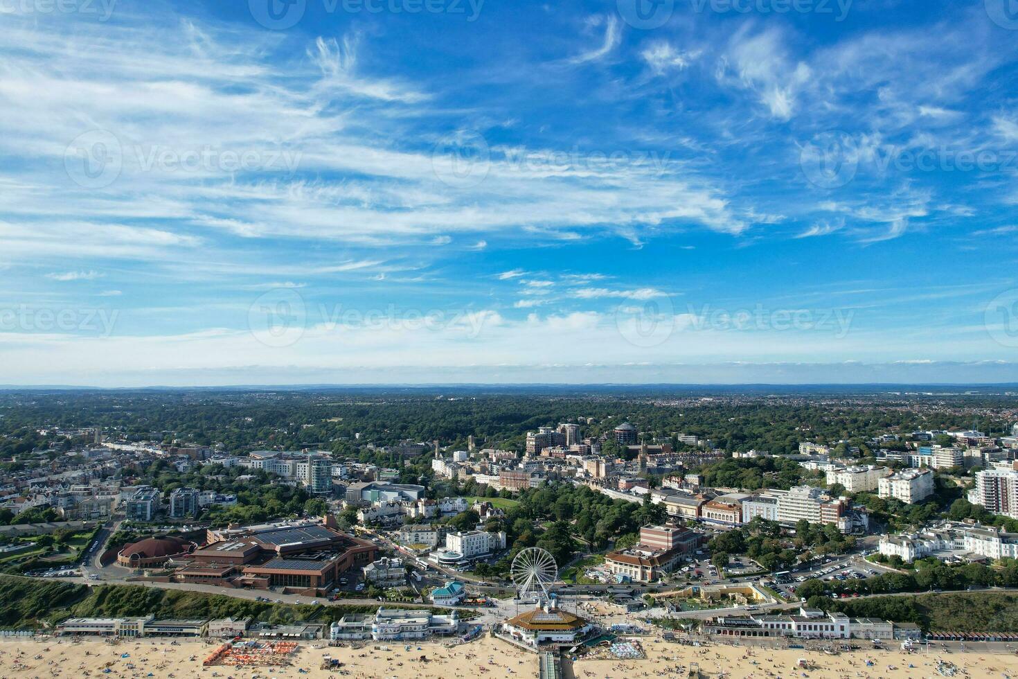 Aerial View of Most Beautiful and Attractive Tourist Destination at Bournemouth City Sandy Beach of England Great Britain, Image Was Captured with Drone's Camera on August 23rd, 2023 During sunny Day. photo
