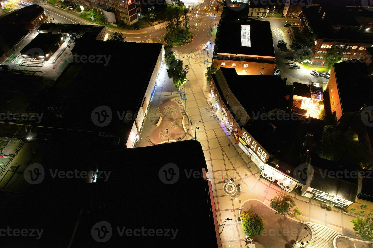 Aerial View of Illuminated Downtown Buildings, Roads and Central Luton City of England UK at Beginning of Clear Weather Night of September 5th, 2023 photo