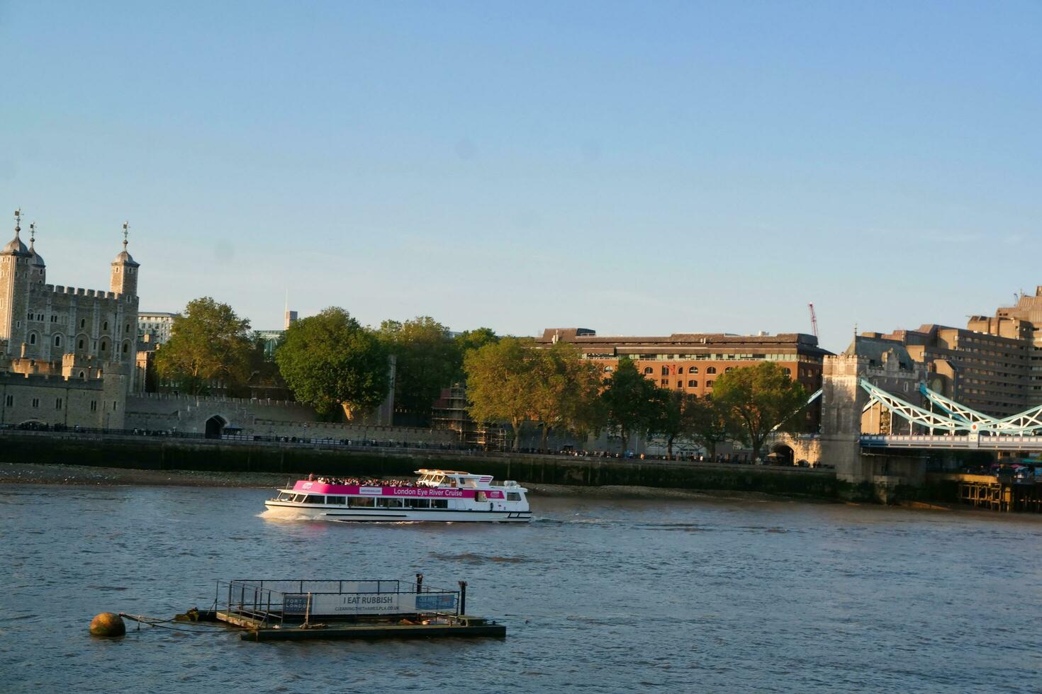 Best View of Boat over River Thames Waters at London Bridge, Capital City of England Great Britain. The Image Was Captured June 4th, 2023 photo