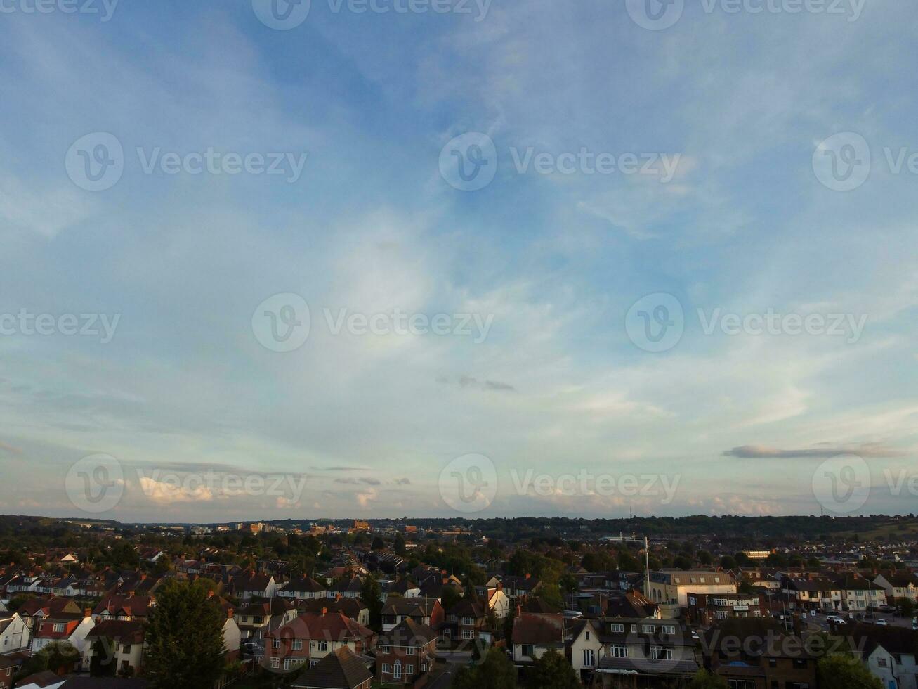 High Angle view of Beautiful Clouds and Sky over Luton City During Sunset photo