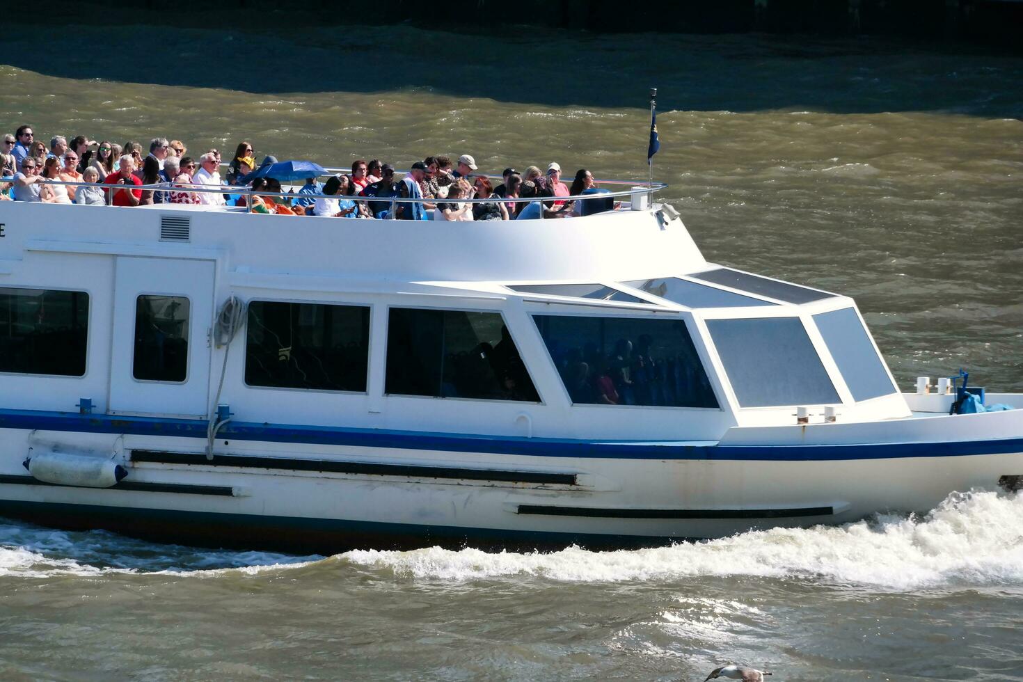 Best View of Boat over River Thames Waters at London Bridge, Capital City of England Great Britain. The Image Was Captured June 4th, 2023 photo