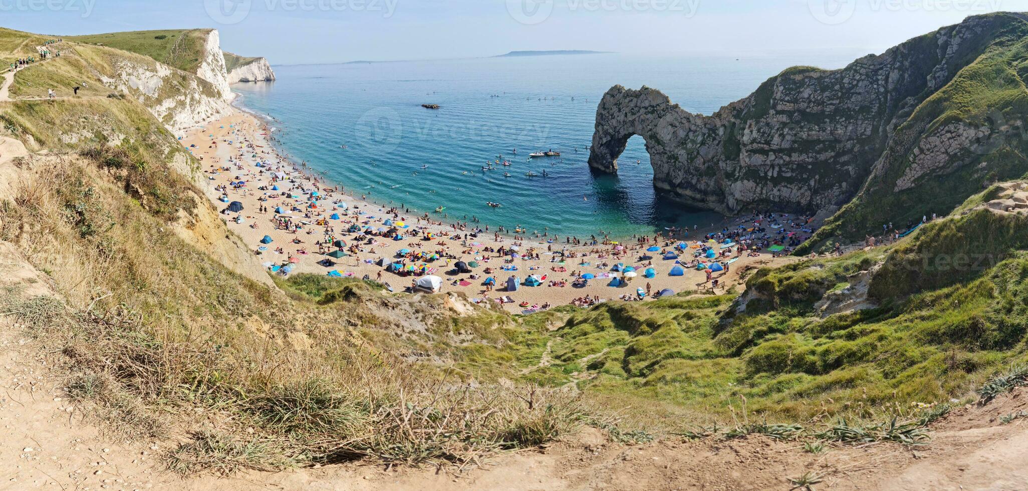 Most Beautiful High Angle View of British Landscape and Sea View of Durdle Door Beach of England Great Britain, UK. Image Was captured with Drone's camera on September 9th, 2023 photo