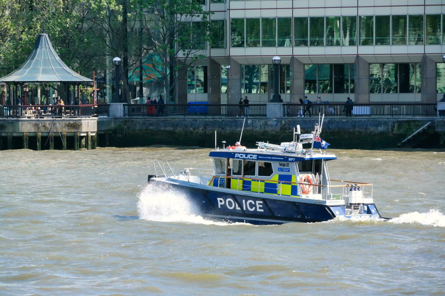 Best View of Boat over River Thames Waters at London Bridge, Capital City of England Great Britain. The Image Was Captured June 4th, 2023 photo