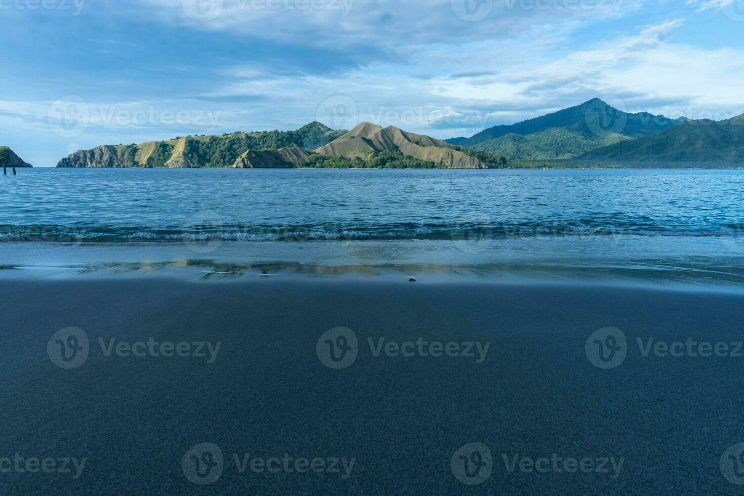 Beautiful view of Pulo Dua Balantak hill, view of blue sea and white clouds with blue sky located in the Banggai district of Central Sulawesi, Indonesia photo