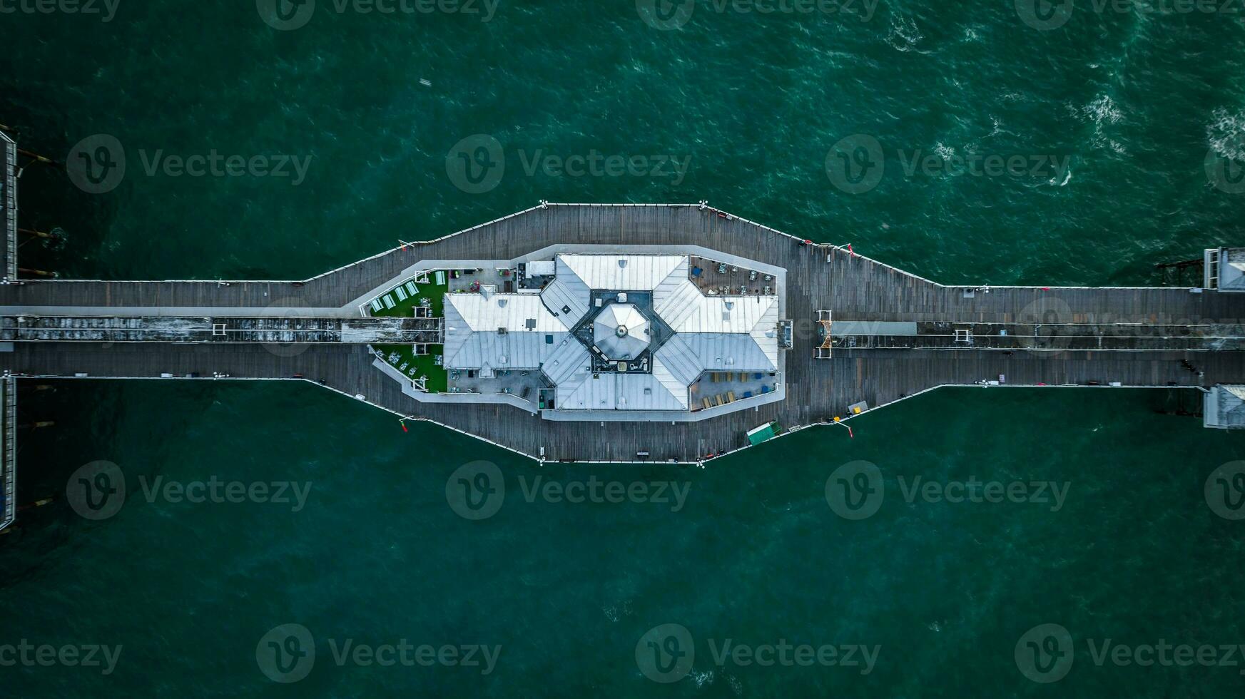 Aerial image of Brighton pier in early evening taken by a drone, East Sussex, UK photo