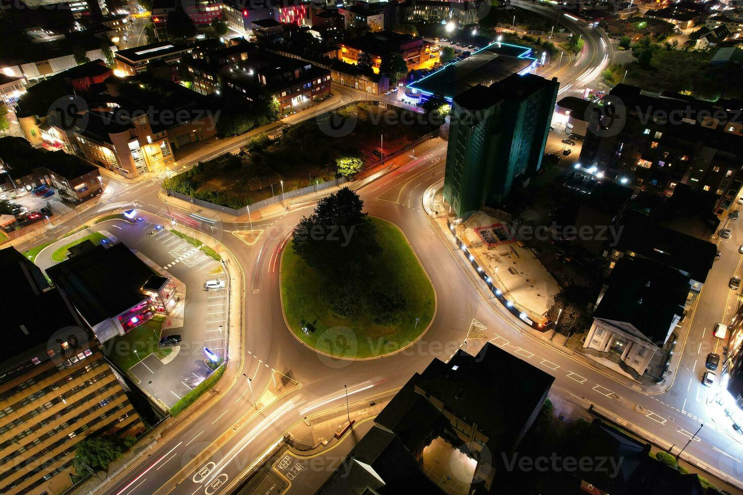 Aerial View of Illuminated Downtown Buildings, Roads and Central Luton City of England UK at Beginning of Clear Weather Night of September 5th, 2023 photo