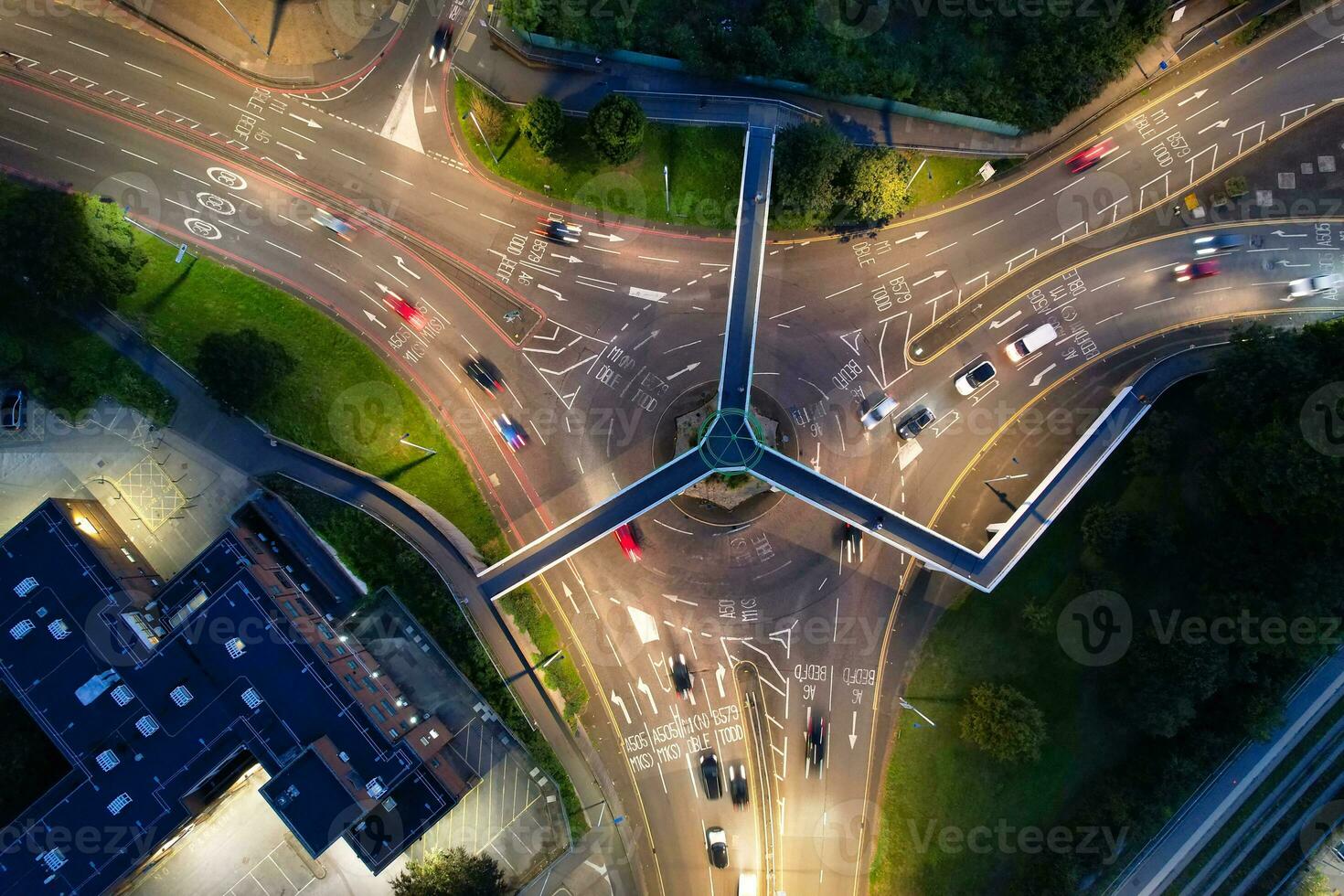 Aerial View of Illuminated Downtown Buildings, Roads and Central Luton City of England UK at Beginning of Clear Weather Night of September 5th, 2023 photo