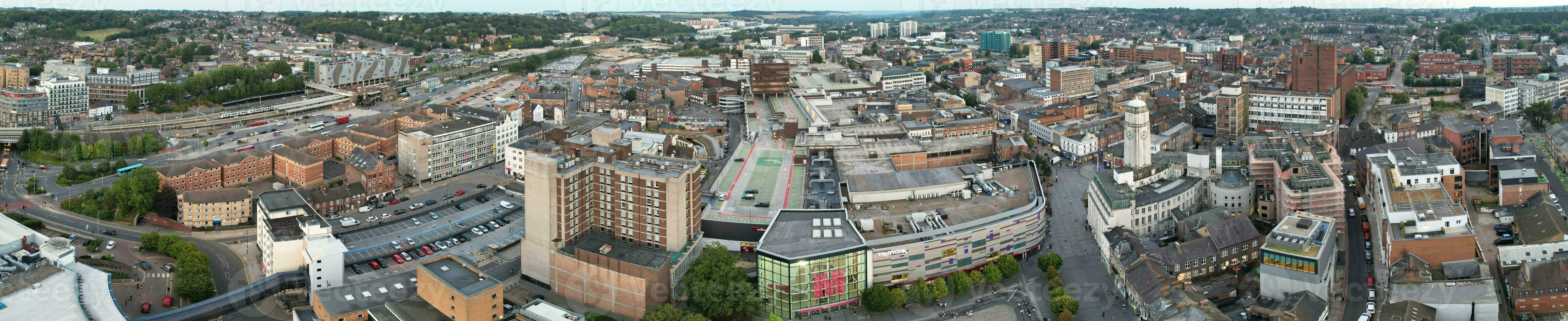 Ultra Wide Aerial Panoramic View of Illuminated Downtown Buildings, Roads and Central Luton City of England UK at Beginning of Clear Weather's Night of September 5th, 2023 photo