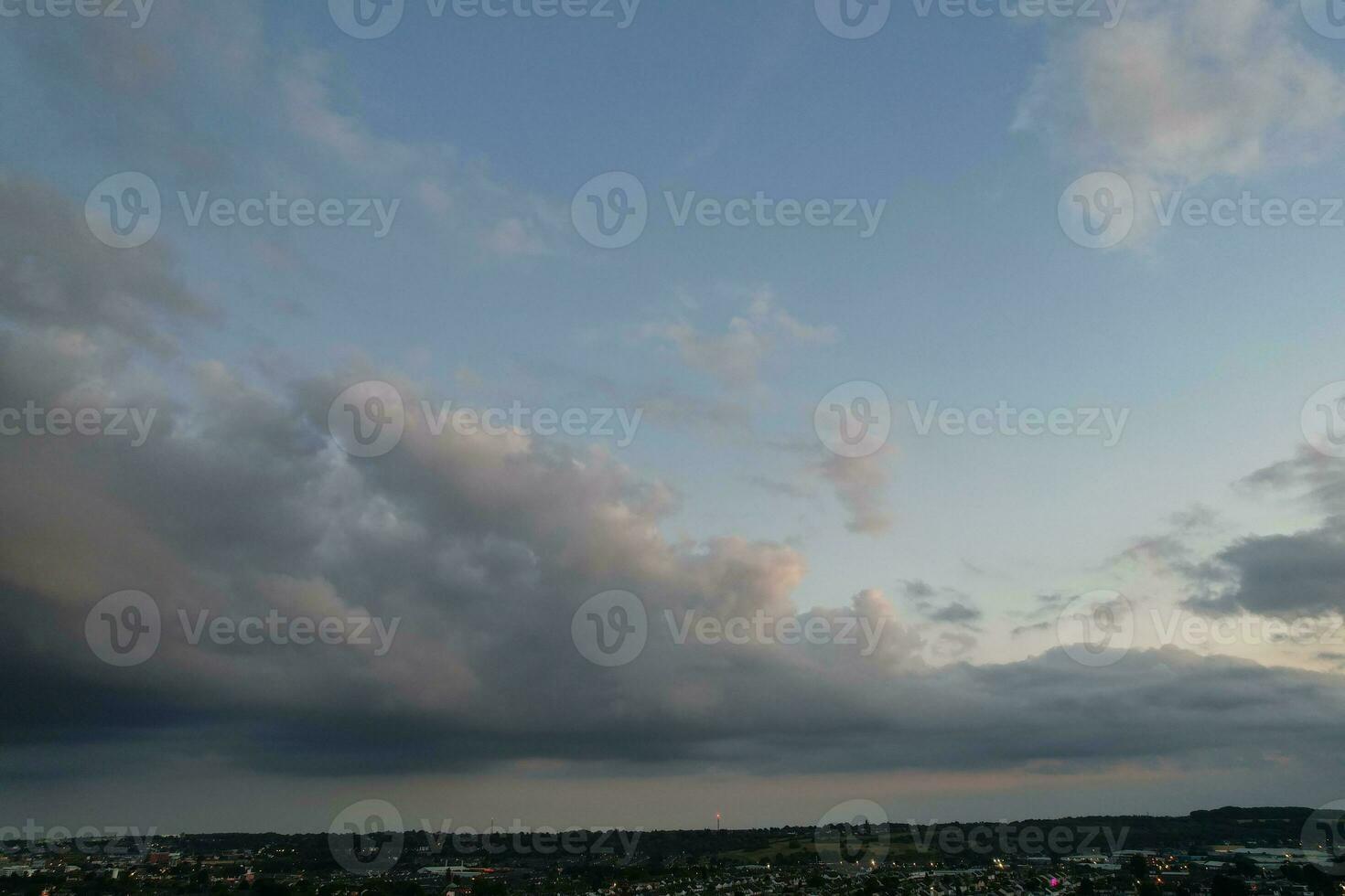 Most Beautiful View of Sky and Dramatic Clouds over Luton City of England UK During Sunset. photo