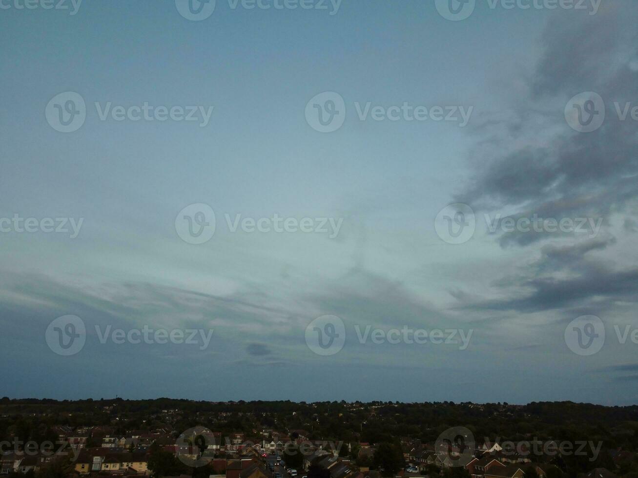 High Angle view of Beautiful Clouds and Sky over Luton City During Sunset photo