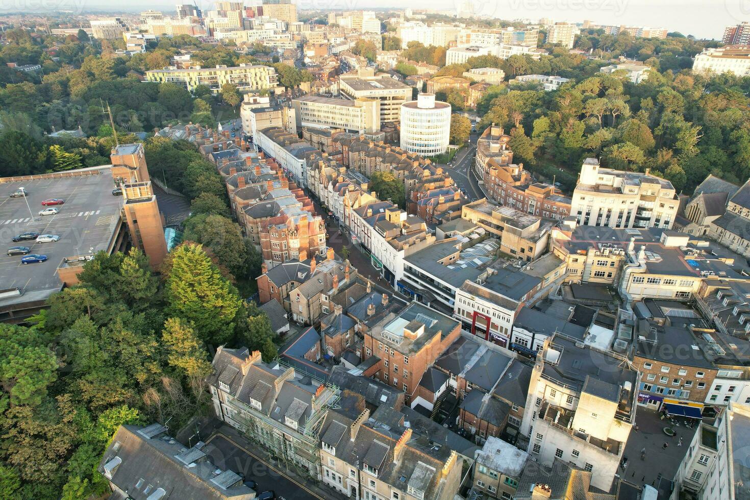 Beautiful Aerial Footage of British Tourist Attraction at Sea View of Bournemouth City of England Great Britain UK. High Angle Image Captured with Drone's Camera on September 9th, 2023 During Sunset photo