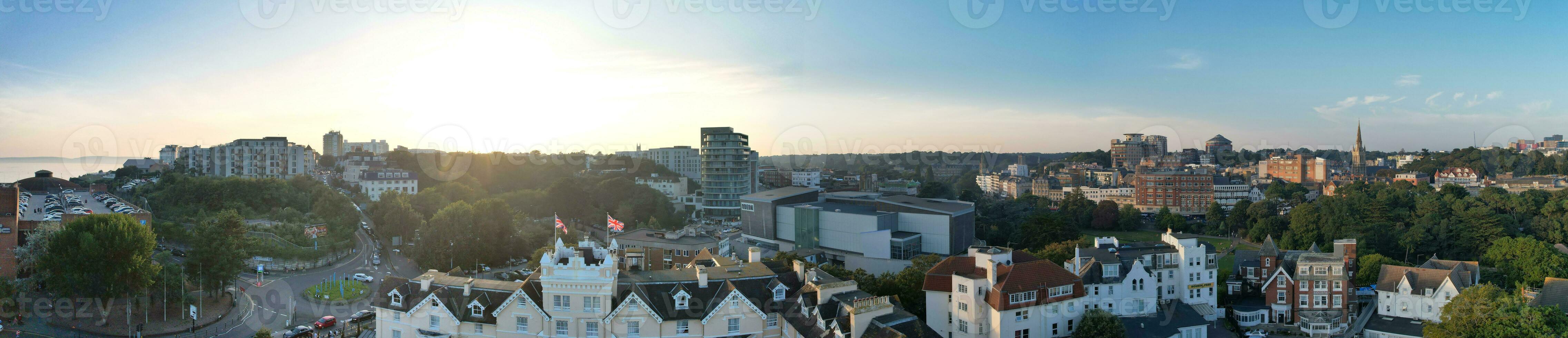 Aerial Panoramic View of British Tourist Attraction at Sea View of Bournemouth City of England Great Britain UK. High Angle Image Captured with Drone's Camera on September 9th, 2023 During Sunset photo