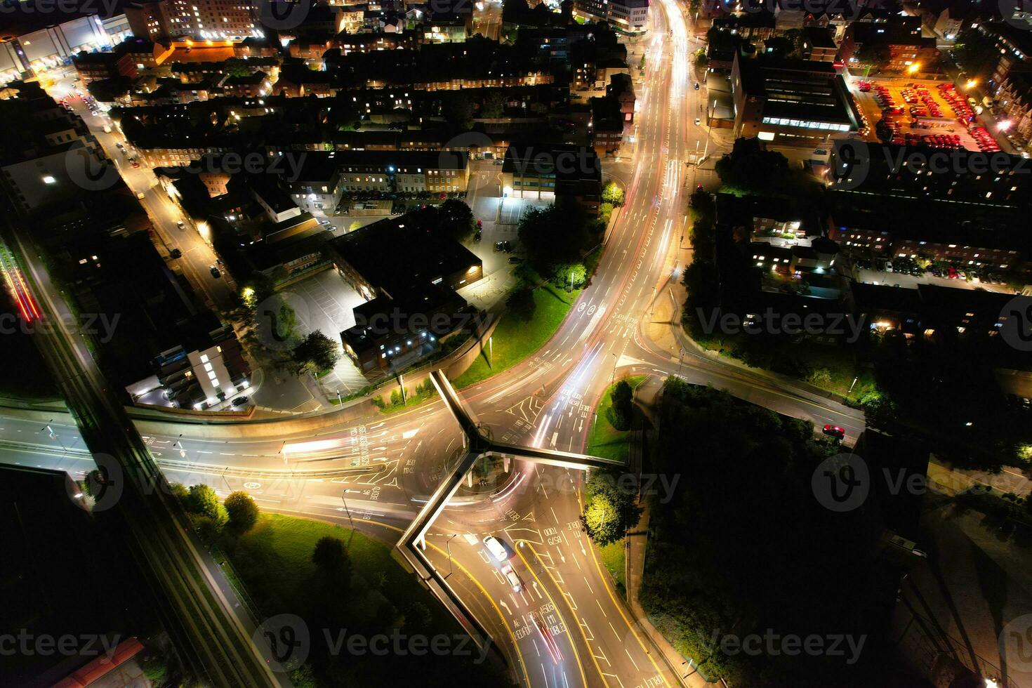 Aerial View of Illuminated Downtown Buildings, Roads and Central Luton City of England UK at Beginning of Clear Weather Night of September 5th, 2023 photo