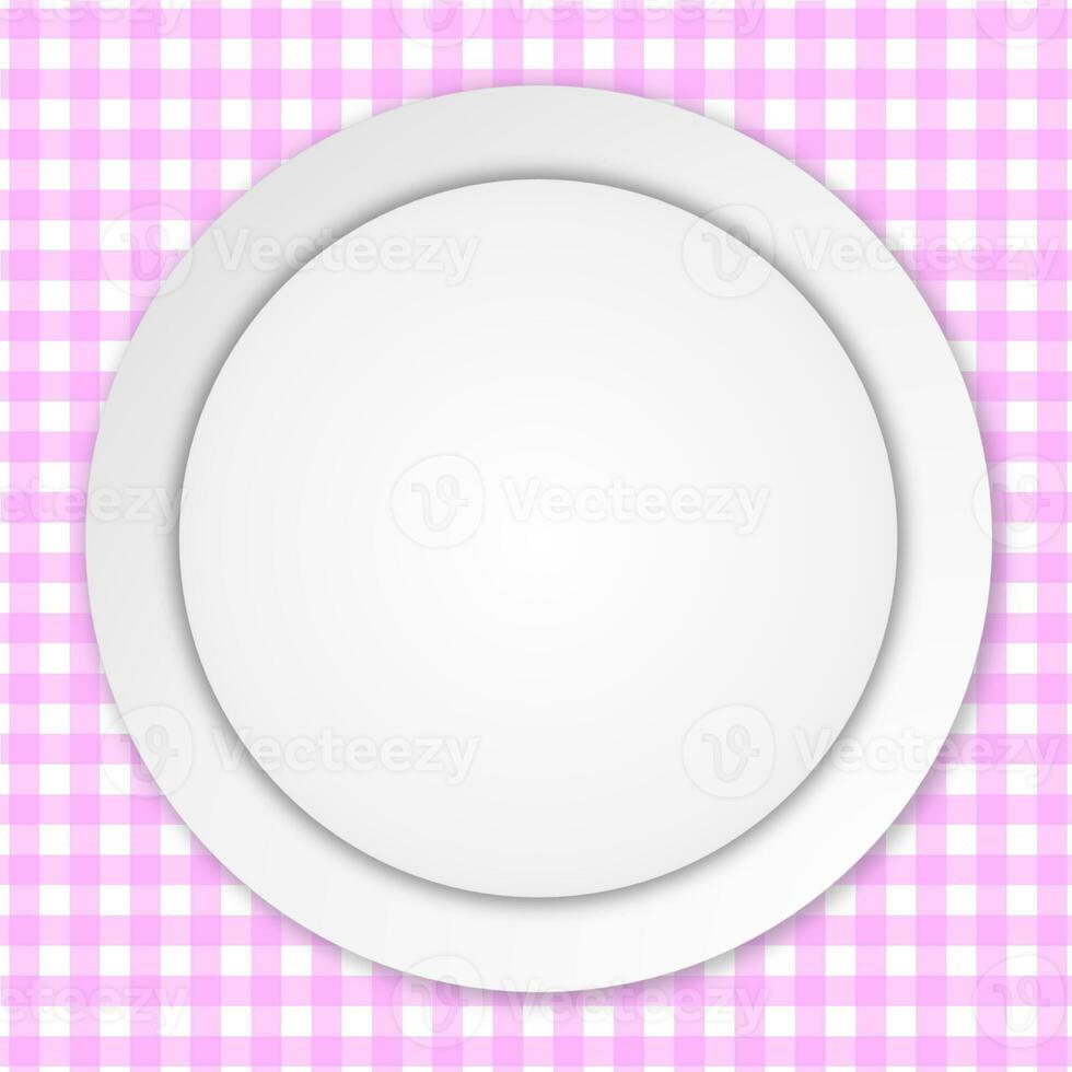 White plate on pink tablecloth photo