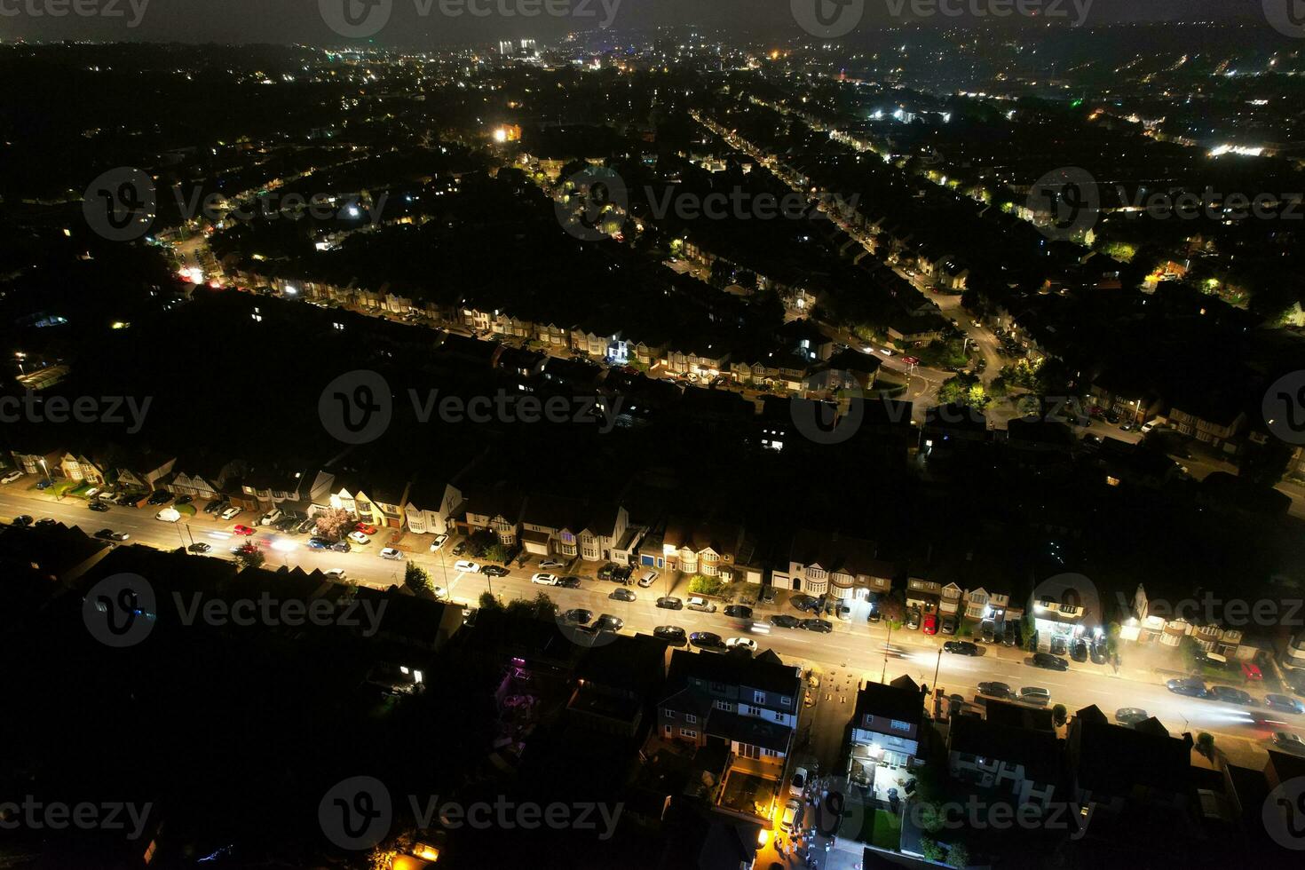 High Angle View of Luton City and Road with Some Traffic During Midnight. photo