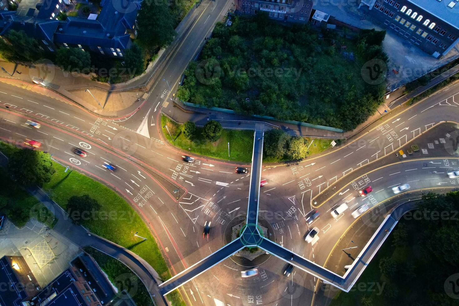 Aerial View of Illuminated Downtown Buildings, Roads and Central Luton City of England UK at Beginning of Clear Weather Night of September 5th, 2023 photo