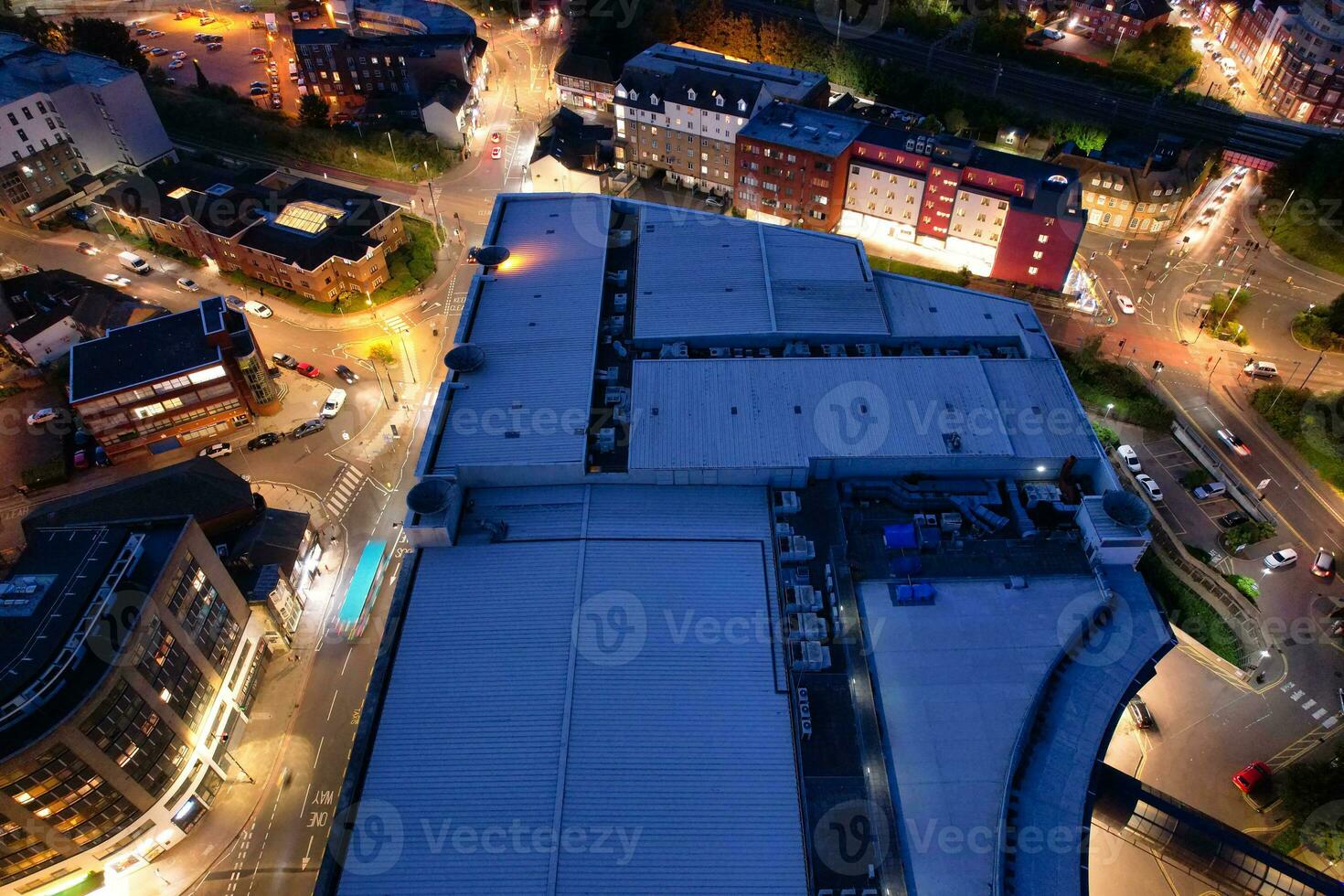 Aerial View of Illuminated Downtown Buildings, Roads and Central Luton City of England UK at Beginning of Clear Weather Night of September 5th, 2023 photo