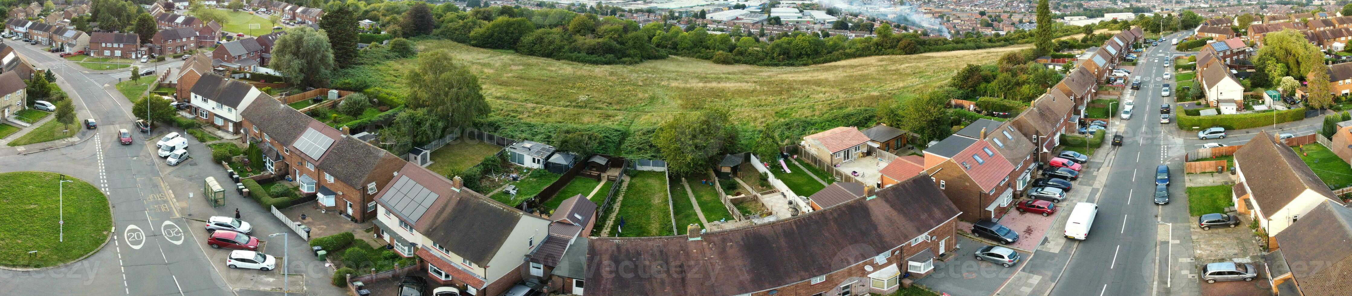 Aerial View of Residential Homes and Industrial Estate Combined at Dallow Road Near Farley Hills Luton City, England UK. The High Angle Footage Was Captured with Drone's Camera on September 7th, 2023 photo