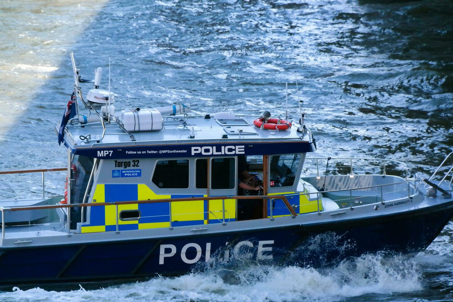 Best View of Boat over River Thames Waters at London Bridge, Capital City of England Great Britain. The Image Was Captured June 4th, 2023 photo