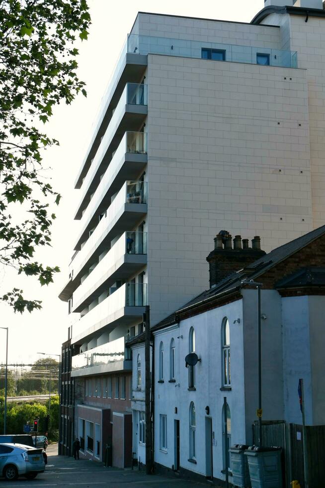 Low Angle View of Central luton City and Downtown Buildings Near Central Railway Station of Luton Town, England Great Britain UK. The Image Captured on Clear sunny Day of June 2nd, 2023 photo
