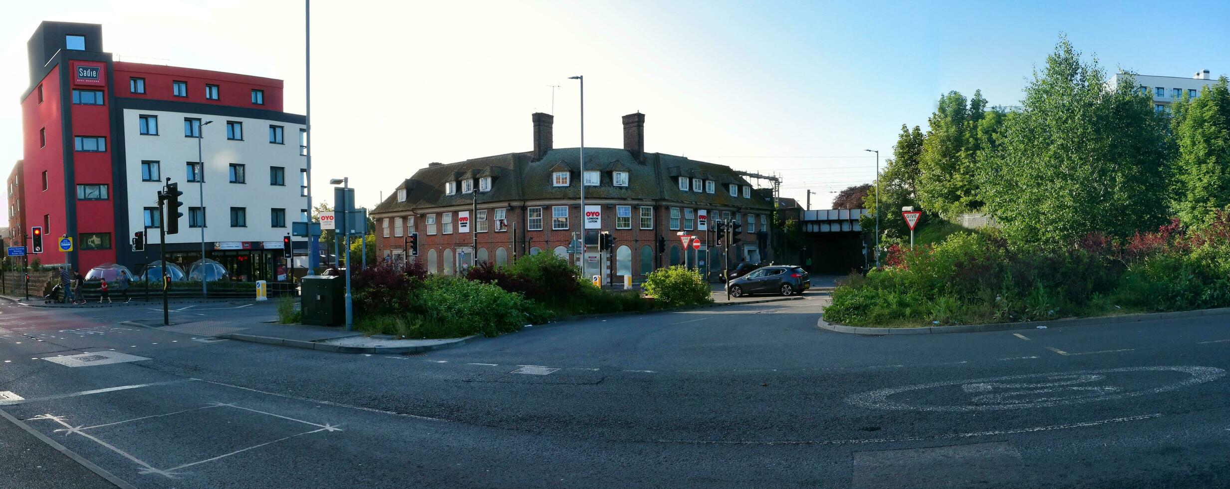 Low Angle View of Central luton City and Downtown Buildings Near Central Railway Station of Luton Town, England Great Britain UK. The Image Captured on Clear sunny Day of June 2nd, 2023 photo