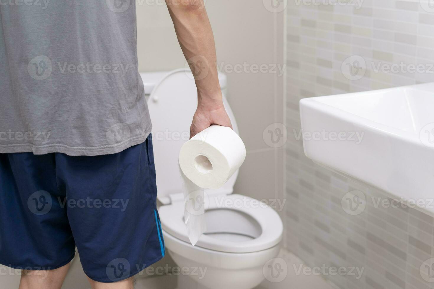 Constipation and diarrhea in bathroom. Hurt man touch belly  stomach ache painful. colon inflammation problem, toxic food, abdominal pain, abdomen, constipated in toilet, stomachache, Hygiene photo