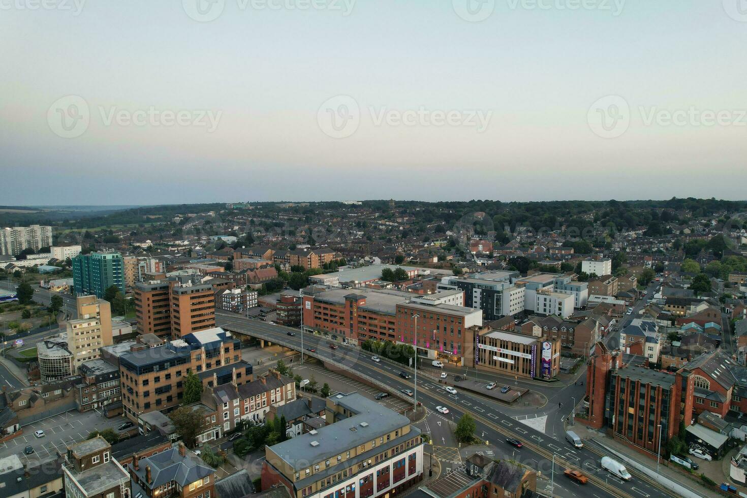 Aerial View of Illuminated Downtown Buildings, Roads and Central Luton City of England UK at Beginning of Clear Weather Night of September 5th, 2023 photo