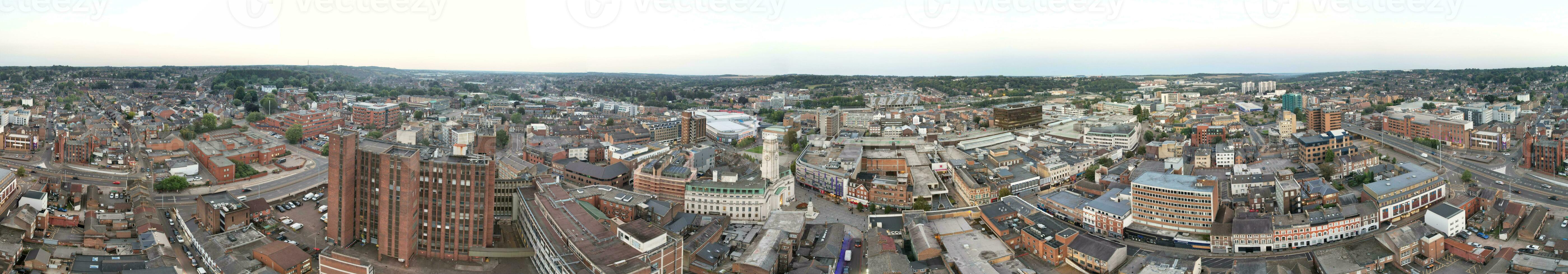 Ultra Wide Aerial Panoramic View of Illuminated Downtown Buildings, Roads and Central Luton City of England UK at Beginning of Clear Weather's Night of September 5th, 2023 photo