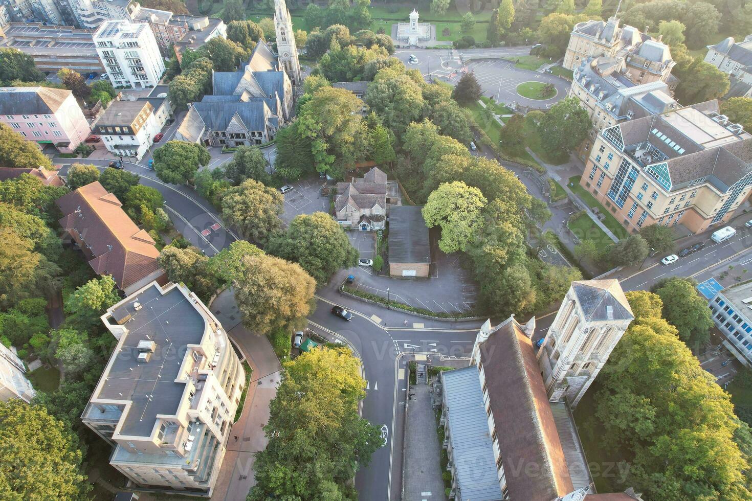 Aerial View of British Tourist Attraction of Bournemouth Beach and Sea view City of England Great Britain UK. Image Captured with Drone's Camera on September 9th, 2023 During Sunset photo