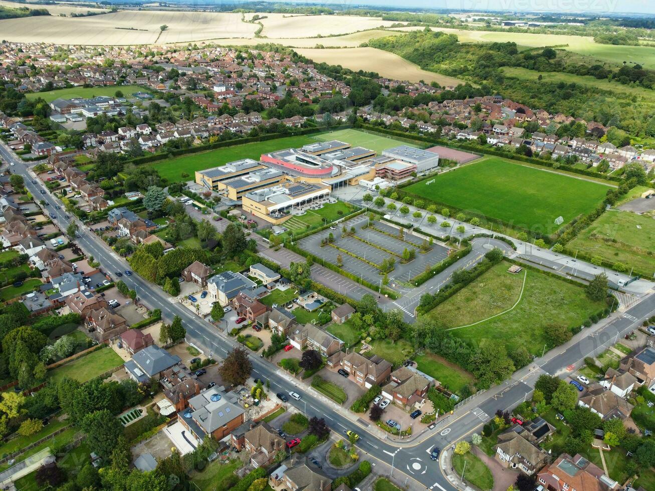 High Angle Footage of Residential Real Estate Homes at East of Luton City of England, Great Britain. Footage Was Captured with Drone's Camera on August 15th, 2023 During Sunset Time. photo