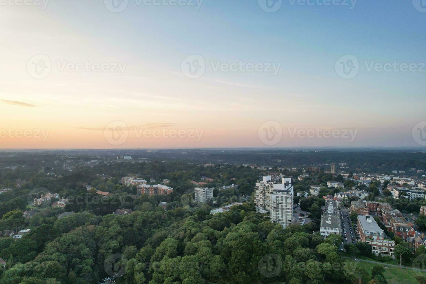 Beautiful Aerial Footage of British Tourist Attraction at Sea View of Bournemouth City of England Great Britain UK. High Angle Image Captured with Drone's Camera on September 9th, 2023 During Sunset photo
