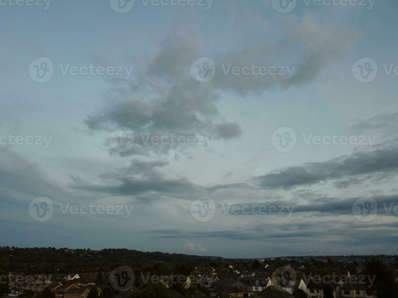 High Angle view of Beautiful Clouds and Sky over Luton City During Sunset photo
