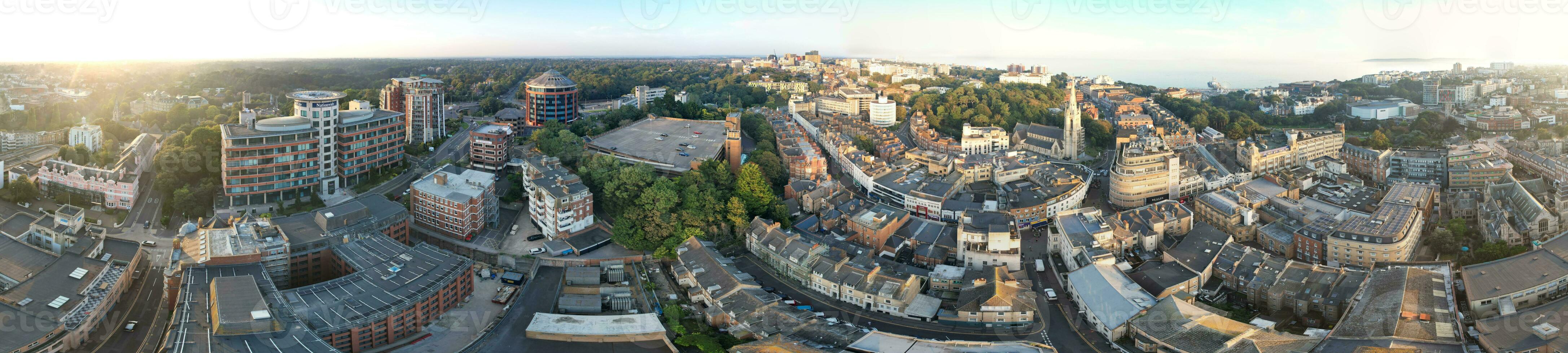 Aerial Panoramic View of British Tourist Attraction at Sea View of Bournemouth City of England Great Britain UK. High Angle Image Captured with Drone's Camera on September 9th, 2023 During Sunset photo