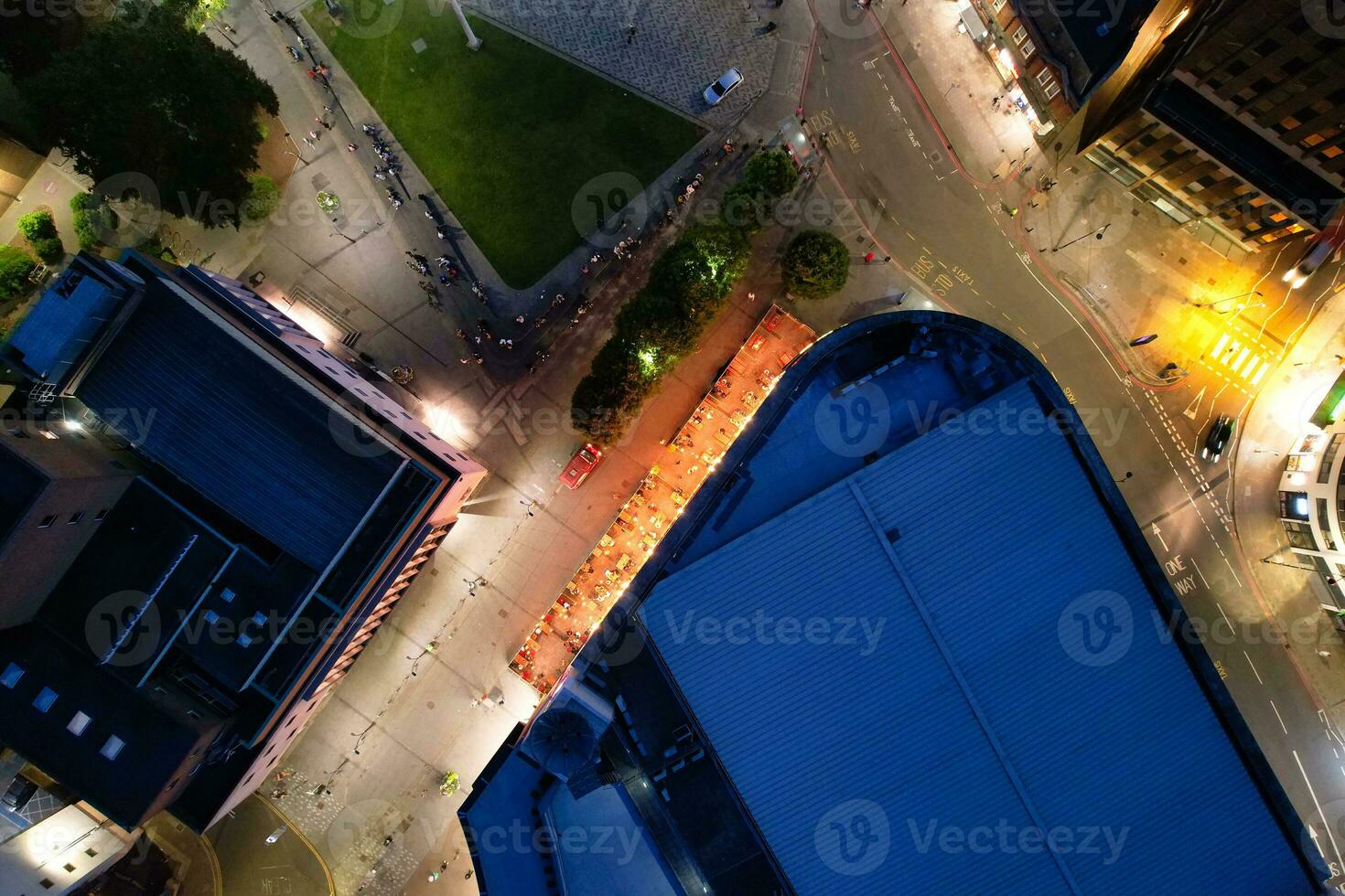 Aerial View of Illuminated Downtown Buildings, Roads and Central Luton City of England UK at Beginning of Clear Weather Night of September 5th, 2023 photo