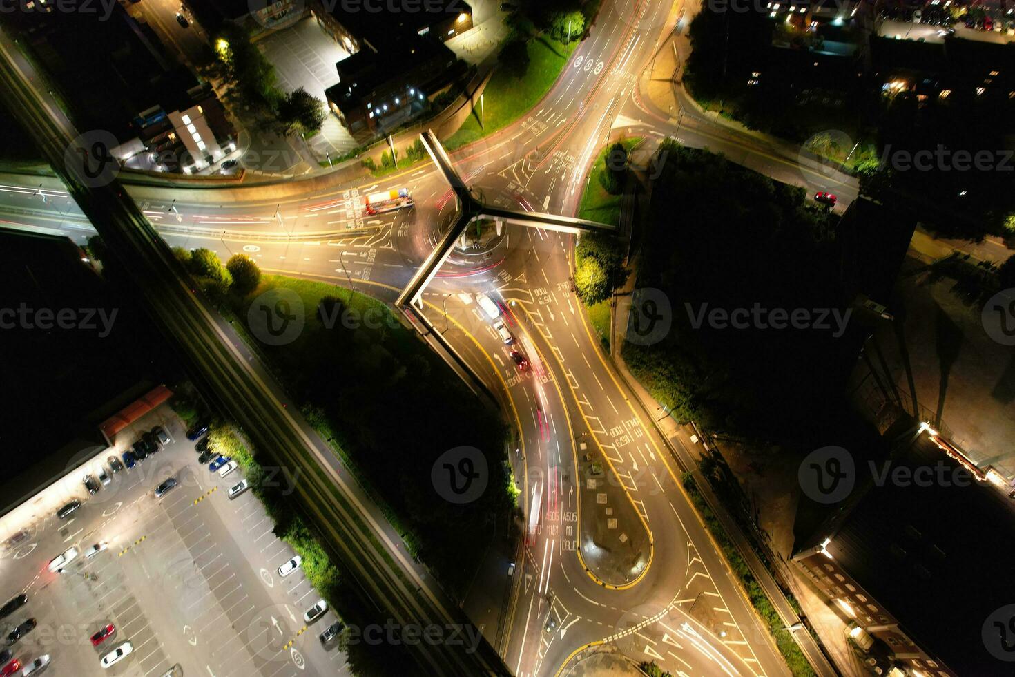 Aerial View of Illuminated Downtown Buildings, Roads and Central Luton City of England UK at Beginning of Clear Weather Night of September 5th, 2023 photo